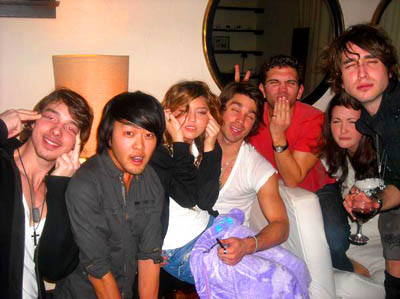 Miley Cyrus and friends make Asian squinty eyes